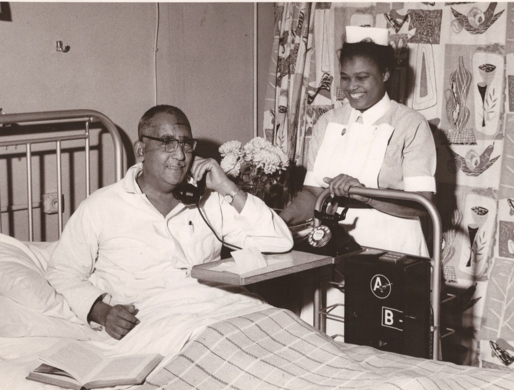 Patient making a phone call from bed