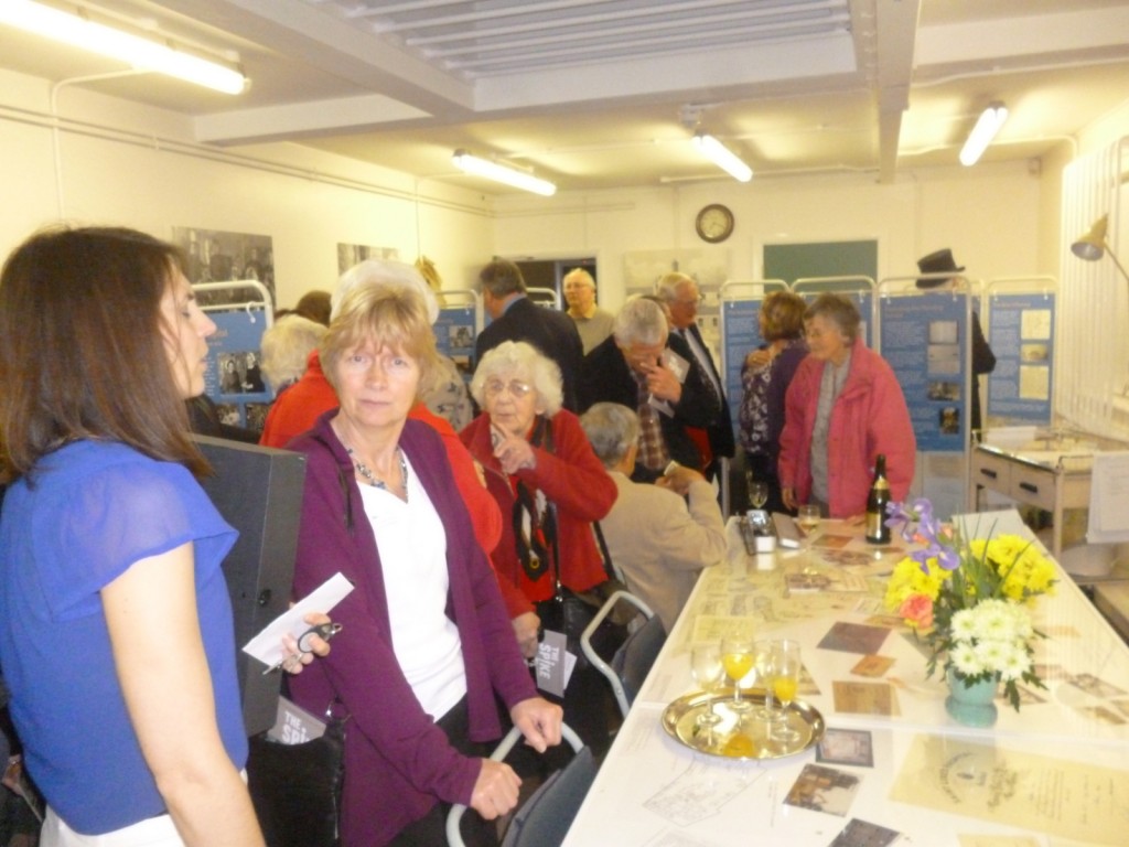 Volunteers and guests at the exhibition